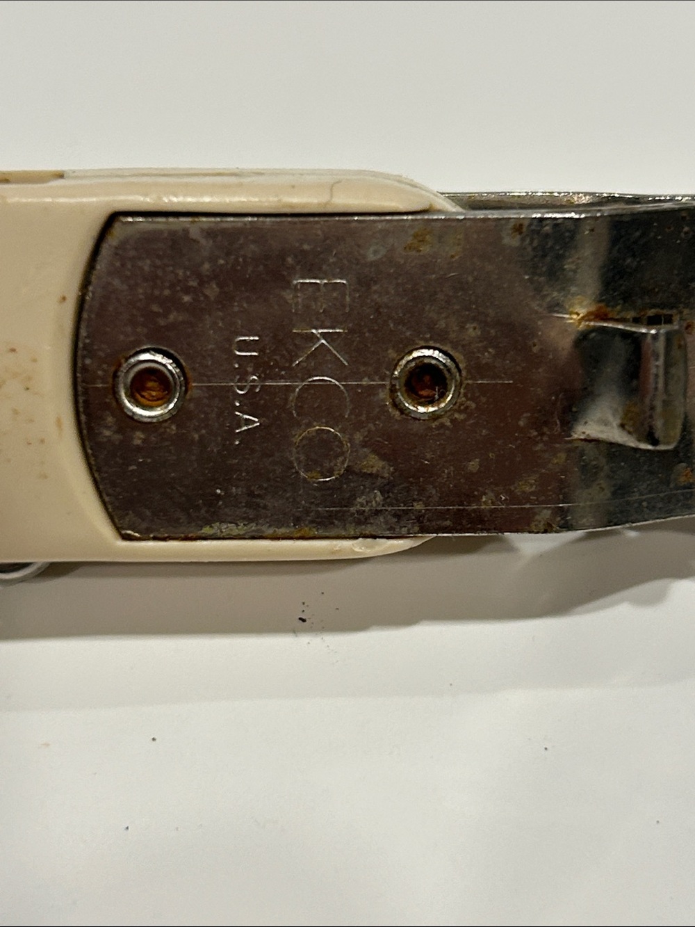 Vintage EKCO can opener and bottle opener with corkscrew. Cream plastic handle.